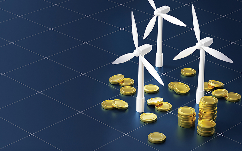 Renewable Energy Investment Concept with Wind Turbines and Coins.credit_istock-2178302769