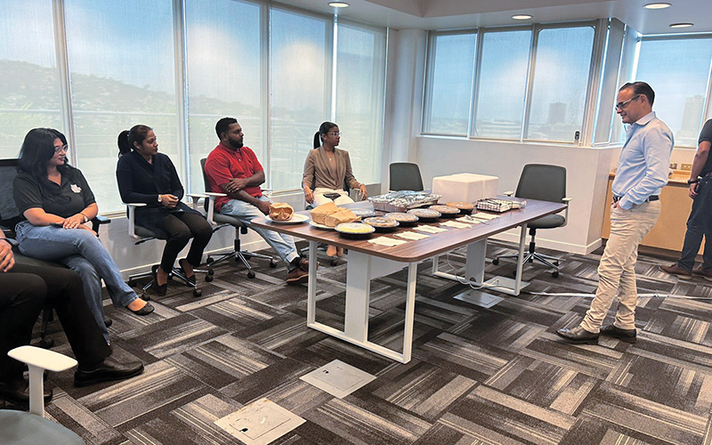 Office meeting with lunch presentation setup.