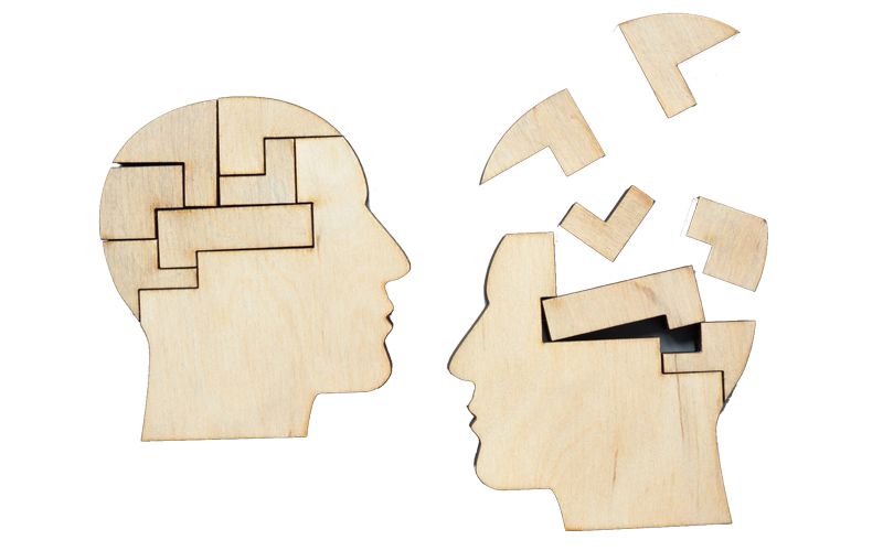 A head assembled from puzzles and disassembled as symbol of mentoring and psychotherapy.CREDIT_istock-2117133894